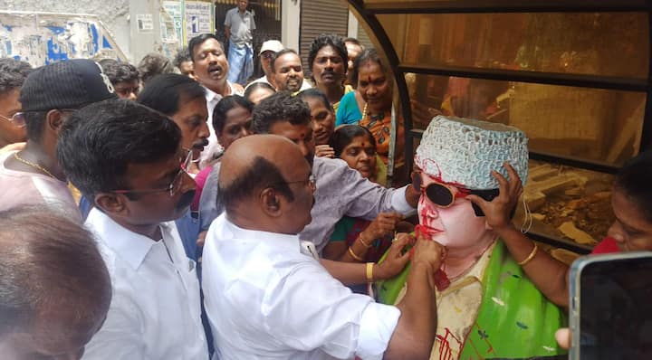 AIADMK leader then performed 'Paal Abhisekam' to MGR statue (Credit: ABP Nadu)