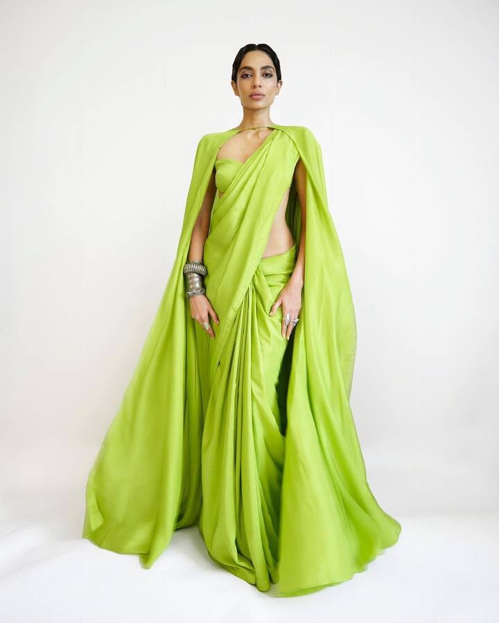 Sobhita opted for a simple neon green saree from Ekaya clothing label.