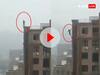फोन से बात कर रहा शख्स अचानक ऊंची बिल्डिंग से कूद गया, VIDEO देख रोंगटे खड़े हो जाएंगे