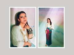 Kajol Poses In A White Shirt Paired With A Red And Blue Wrap Around Skirt