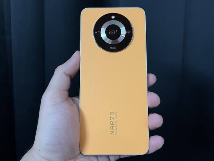 realme narzo 60 5G: स्मार्टफोन की कीमत 17,999 रुपये है. ग्राहकों को 1,000 रुपये का डिस्काउंट दिया जा रहा है. फोन में 64MP का कैमरा, 5000 एमएएच की बैटरी,MediaTek Dimensity 6020 प्रोसेसर, लेदर डिजाइन और 8GB रैम मिलती है.