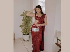 Kajal Aggarwal Oozes Oomph In Shimmery Red Saree