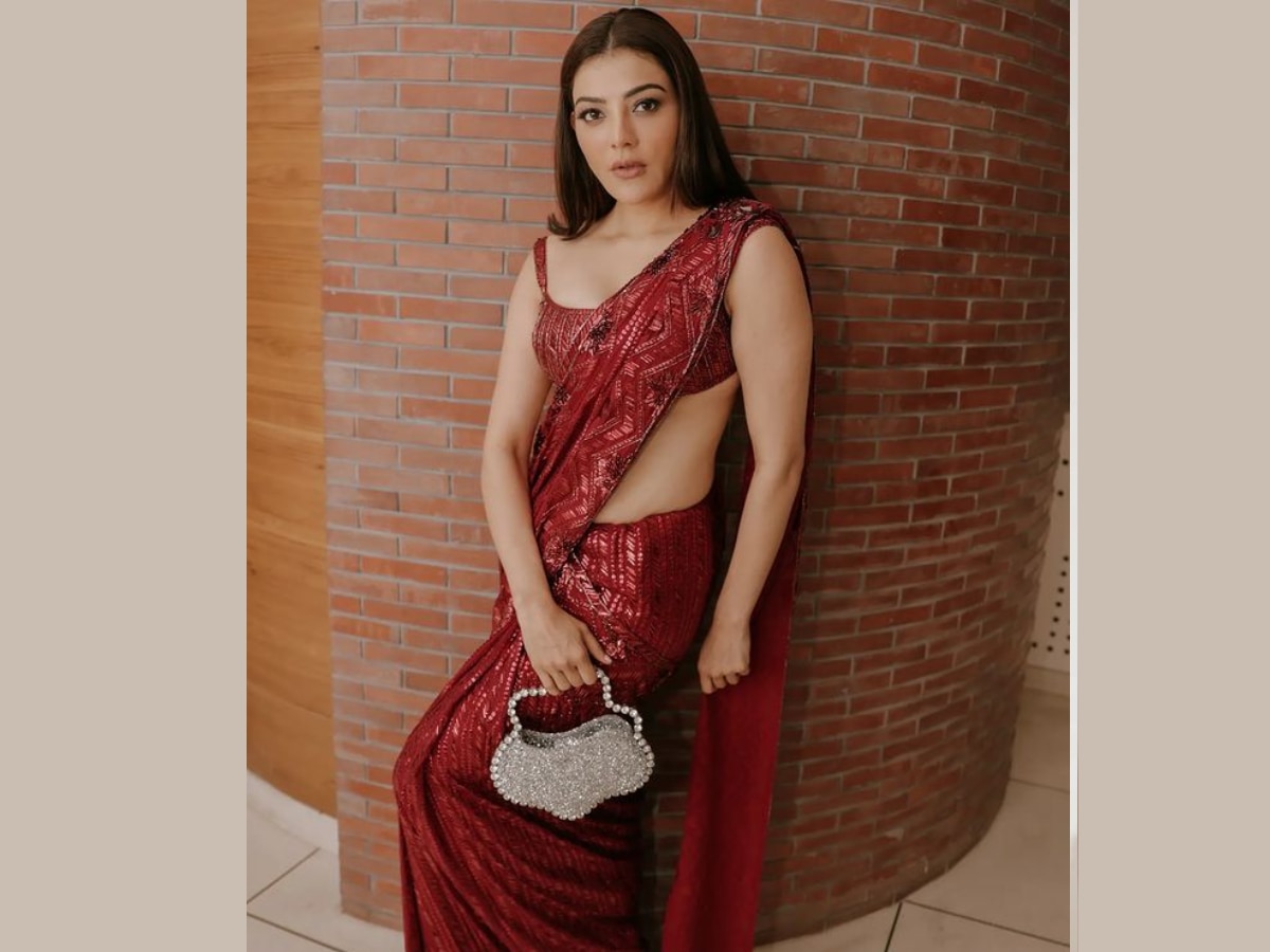 Kajal Aggarwal Oozes Oomph In A Shimmery Red Saree