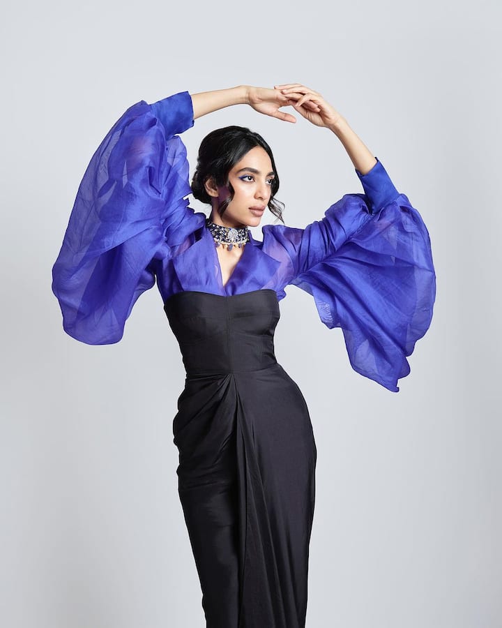 Sobhita was dressed in a strapless black bodycon dress.
