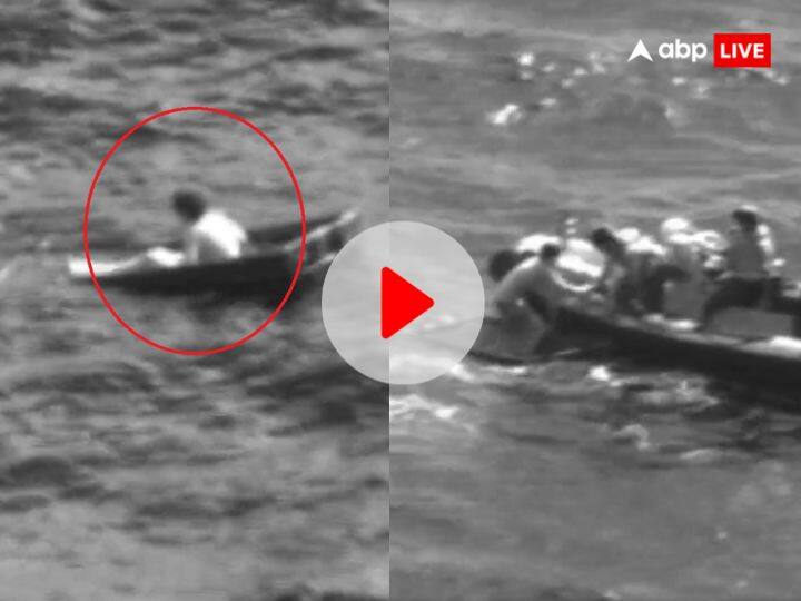Man saved from partially sunken boat rescue after 35 hours in florida video viral बीच समुद्र में आधी डूबी नाव में बहता रहा शख्स, जान बचाने के लिए 35 घंटे लहरों से लड़ता रहा... video रोंगटे खड़े कर देगा