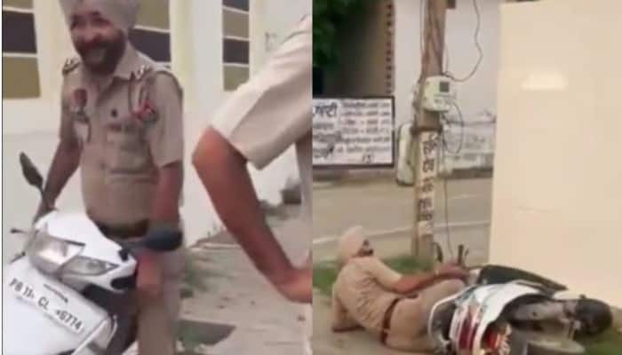 Punjab Police Officers Fall Off Scooty Twice While Trying To Escape From Vigilance Raid ਵਿਜੀਲੈਂਸ ਤੋਂ ਬੱਚਣ ਲਈ ਸਕੂਟੀ ਖੋਹ ਕੇ ਫਰਾਰ ਹੋਏ ਪੁਲਿਸ ਮੁਲਾਜ਼ਮ , ਦੋ ਵਾਰ ਸਕੂਟੀ ਤੋਂ ਡਿੱਗੇ