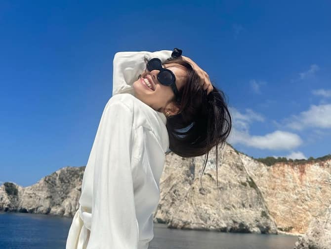 BLACKPINK's Lisa Drops Pictures While Allegedly Holidaying With