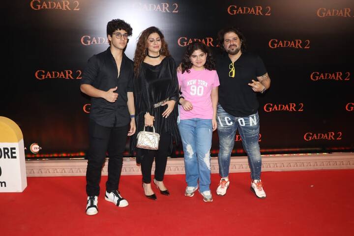 Tannaz and Bakhityaar Irani arrive with their kids.