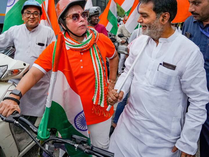 Union MoS for Culture Meenakshi Lekhi and BJP MP Ram Kripal Yadav during the Har Ghar Tiranga Bike Rally. (Photo: PTI)