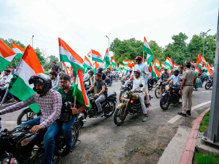 BJP MP Jagdambika Pal with other participants during the Har Ghar Tiranga Bike Rally in New Delhi. (Photo: PTI)