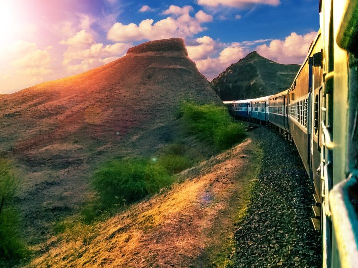 Download Take a Magical Ride Aboard This Scenic Train Wallpaper  Wallpapers com