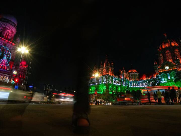 Two famous buildings of Mumbai, Chhatrapati Shivaji Maharaj Terminus and Brihanmumbai Corporation (BMC) building illuminated in the colours of the national flag ahead of the 76th Independence Day. Image Source: PTI