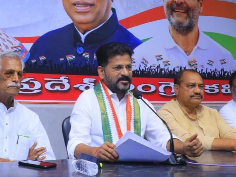 Telangana Congress President Revanth Reddy FIR For Threatening Cops Over 'Red Diary' Three FIRs Against Telangana Congress President Revanth Reddy For Threatening Cops Over 'Red Diary'