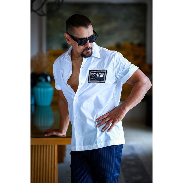 The PS 1, PS 2 actor sported a white shirt and blue denims with a pair of sunglasses