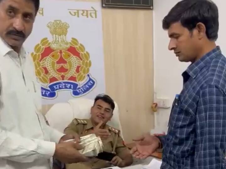 UP News: नोएडा पुलिस के SHO पर ढाई लाख रुपये लेकर समझौता कराने का आरोप, वीडियो वायरल होने पर हुआ ये एक्शन Noida Police SHO Line Attached After accused of compromising with 2.5 lakh rupees in A Case video viral UP News: नोएडा पुलिस के SHO पर ढाई लाख रुपये लेकर समझौता कराने का आरोप, वीडियो वायरल होने पर हुआ ये एक्शन