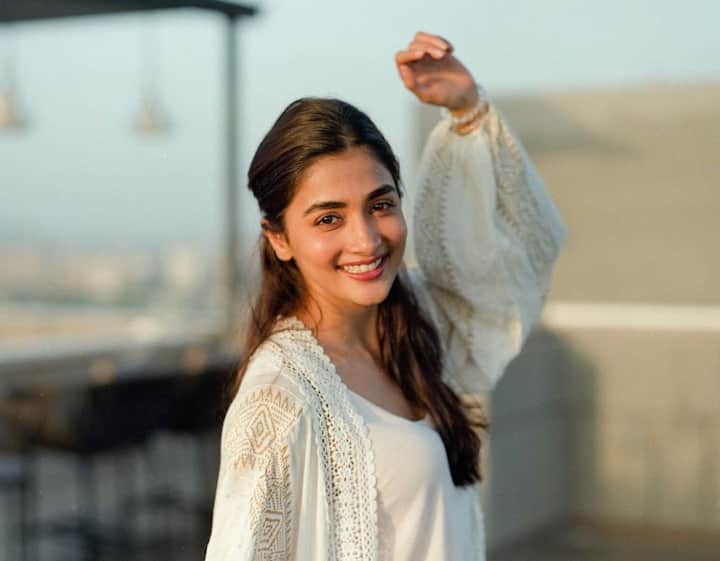 Pooja's choice of jewelry is often a mix of delicate pieces and statement accessories, adding a touch of glamour to her outfits. Her social media is a testament to her love for experimenting with styles, making her a true fashion maven.