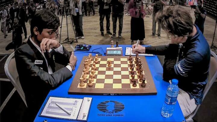 R Praggnanandhaa vs Magnus Carlsen: প্রজ্ঞানন্দের বিশ্বচ্যাম্পিয়ন হওয়া, না হওয়ার বিষয়টা কাল গেম ২-র পর জানা যাবে। কাল সাদা নিয়ে গেম ২ খেলবেন কার্লসেন।