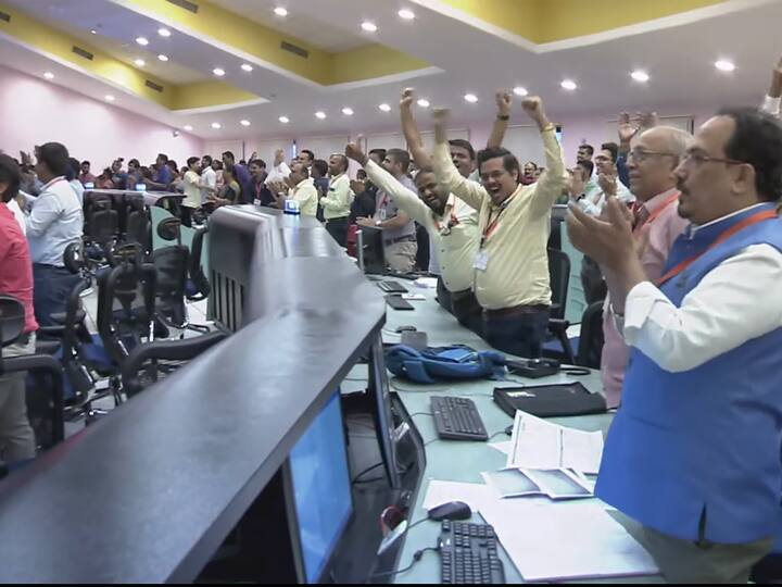 Scientists celebrated at the control room of ISRO headquarters after India's third lunar mission Chandrayaan-3's Lander Module (LM) successfully touched down on the Moon's surface. (Image Source: PTI)