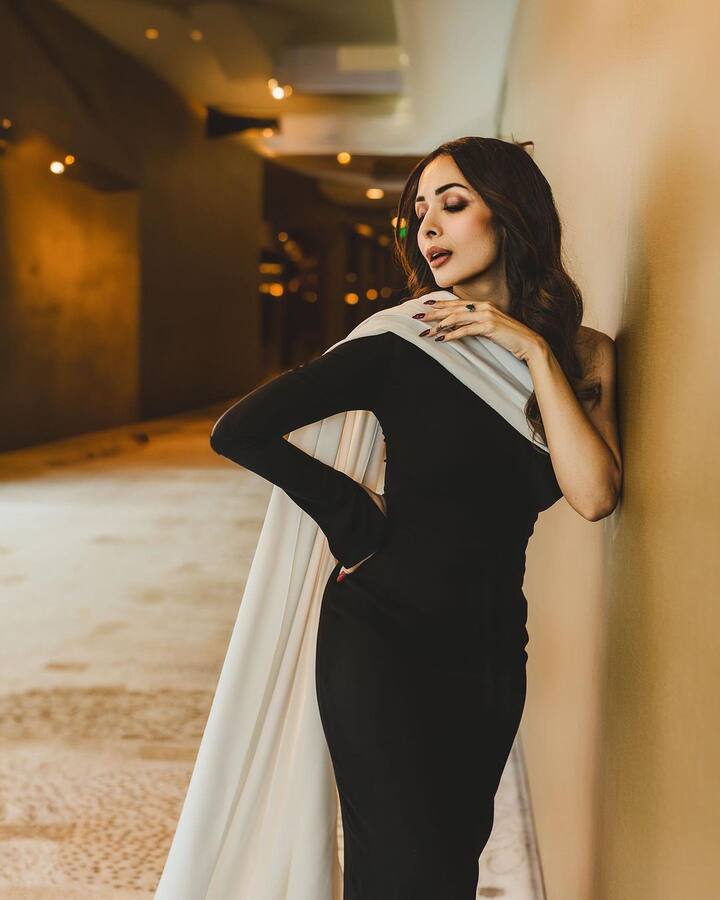 Malaika accessorised the look with black pumps, an emerald ring, and dainty silver emerald earrings. (Image Source: Instagram/Aastha Sharma)