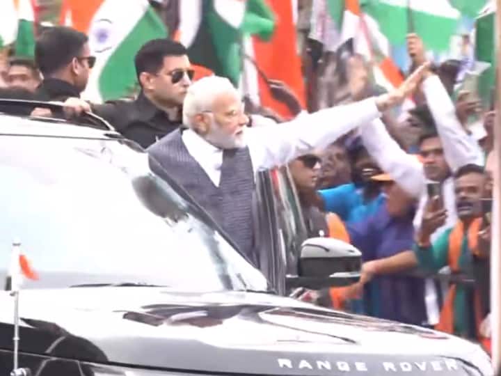 PM Modi holds a roadshow before heading to the space agency, ISRO. (Source: PTI)