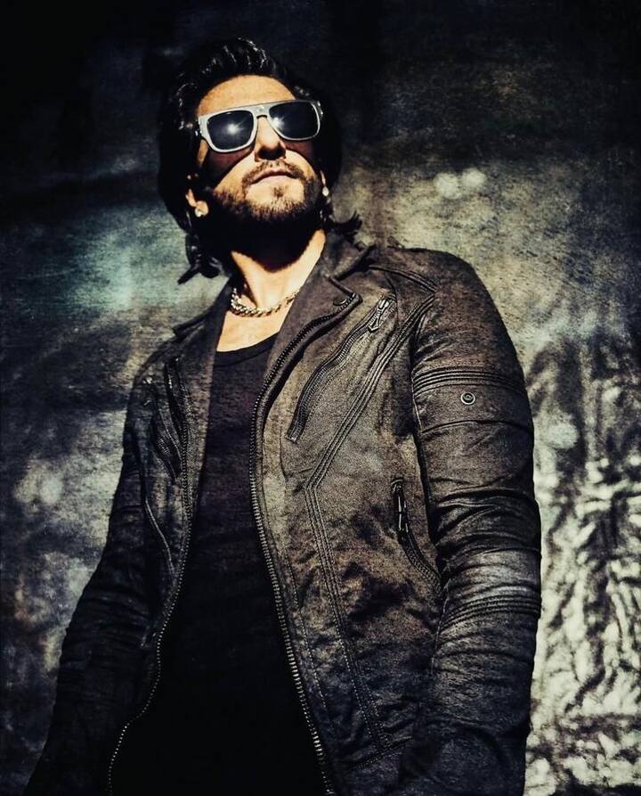 A cool biker look: Wearing a full black jacket with cool black goggles, Ranveer is definitely the hottest biker in the town.