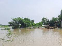 PHOTOS: सहरसा में उफान पर कोसी, कई गांवों में घुसा पानी, स्कूल भी डूबा, इन तस्वीरों से देखें हालात