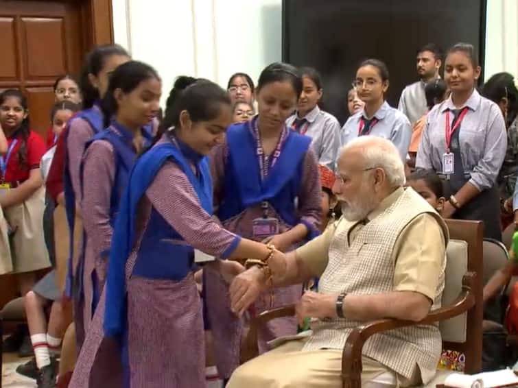 Raksha Bandhan 2023 Prime Minister Modi Celebrates Rakhi With School Girls Delhi watch Raksha Bandhan: School Girls Tie Rakhi To PM Modi At His Residence — Watch