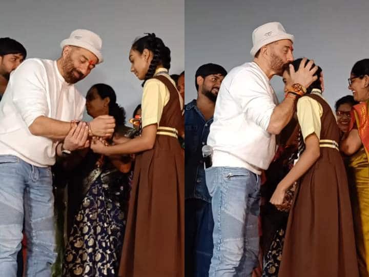 Sunny Deol celebrated Rakshabandhan with school girl fans in theatre during Gadar 2 screening tied Rakhi कलाई पर बंधवाई राखी, बच्चों का चूमा माथा! थिएटर में Sunny Deol ने फैंस के साथ ऐसे मनाया रक्षाबंधन