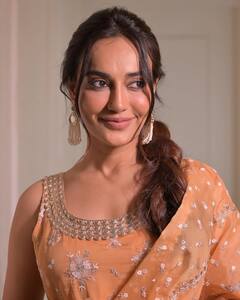 Surbhi Jyoti Looks Elegant In A Light Orange Salwar Suit