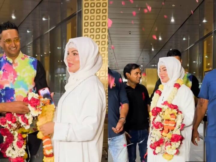 Rakhi Sawant gets a floral welcome at airport upon return from Umrah says Rakhi nahi Fatima bolo उमराह करके मुंबई लौंटी Rakhi Sawant का एयरपोर्ट पर हुआ खास अंदाज में स्वागत, बोलीं- 'राखी नहीं फातिमा बोलो'