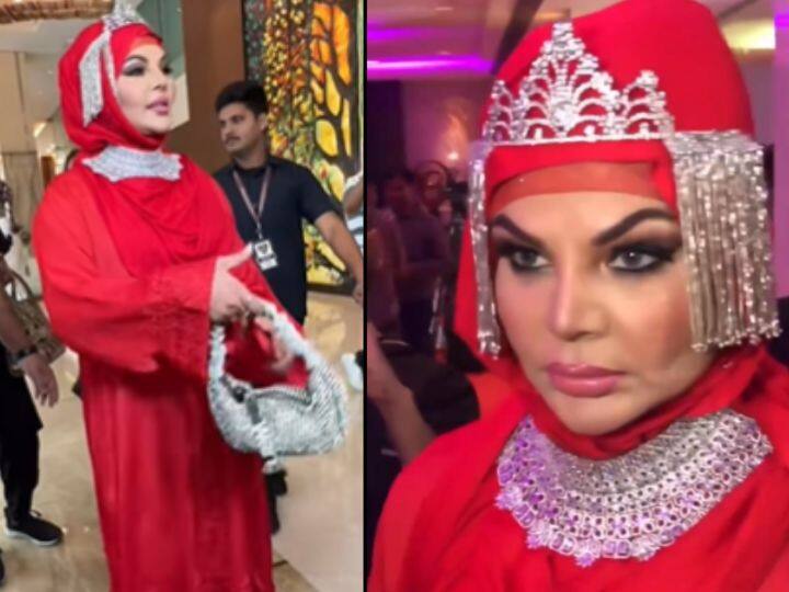 Rakhi Sawant wears red abaya with crown for an award event Users trolled Rakhi Sawant In Abaya: लाल रंग का अबाया, हैवी नेकलेस के साथ राखी सावंत ने बदला अपना लुक, ऐसी हरकत देखकर यूजर्स ने किया ट्रोल