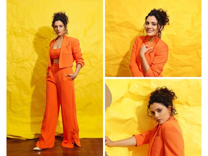Saiyami Kher recently shared pictures on Instagram wearing an orange pantsuit.