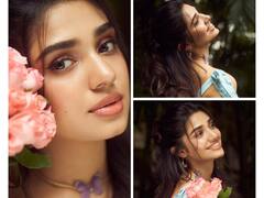 Krithi Shetty Poses In A Blue Floral Dress