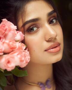 Krithi Shetty Poses In A Blue Floral Dress