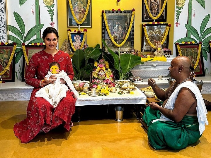 Ram Charan's wife Upasana Kamineni Celebrates First Varalakshmi Vratham With Daughter Klin Kaara, photo went viral on social media Ram Charan की लाडली ने मनाया पहला वरलक्ष्मी व्रतम, लहंगा-चोली पहने मां उपासना  की गोद में बैठी दिखीं Klin Kaara