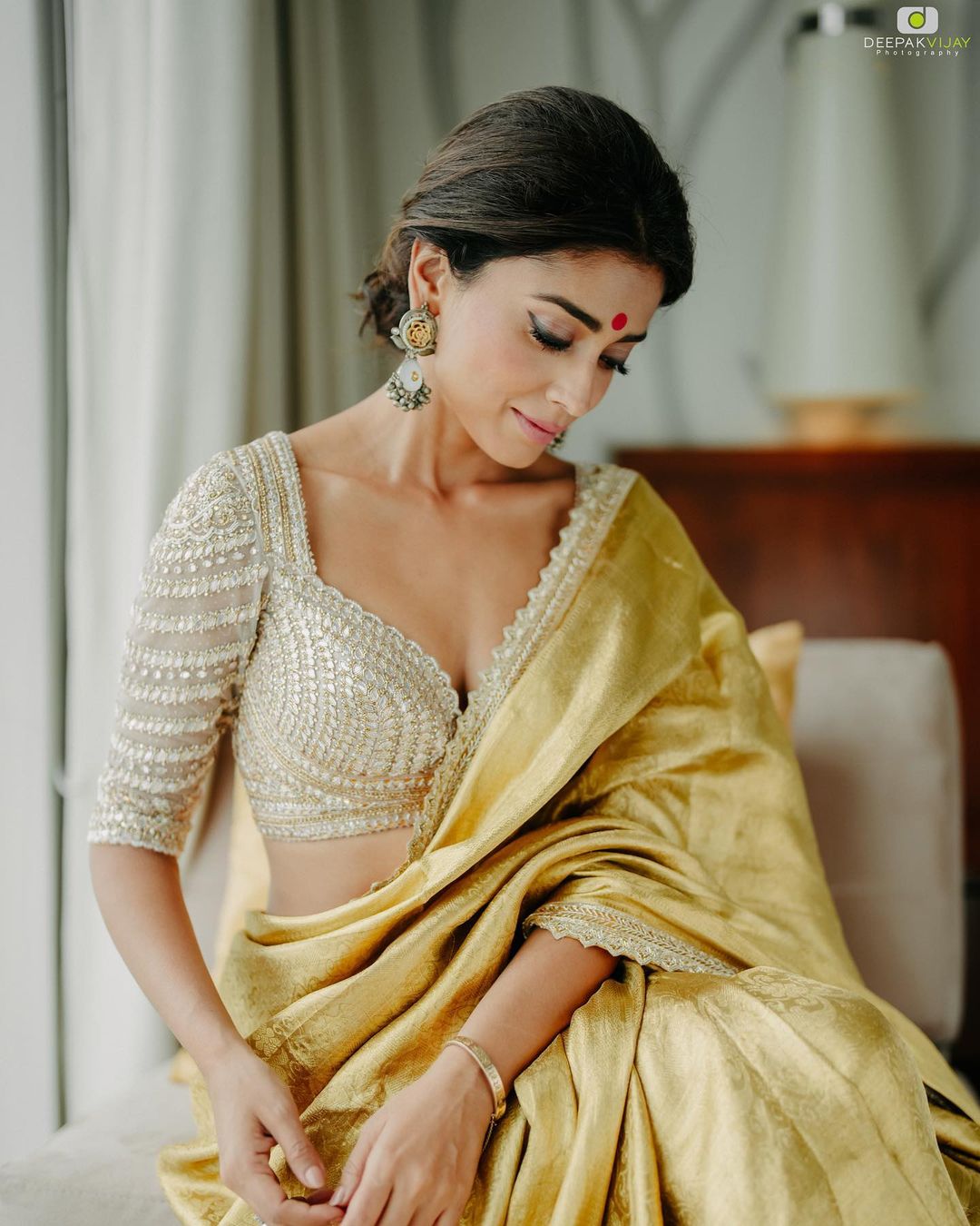 In a bridal look in a silver color saree with checks, dark blue color el… |  Wedding saree blouse designs, Pattu saree blouse designs, Designer saree  blouse patterns