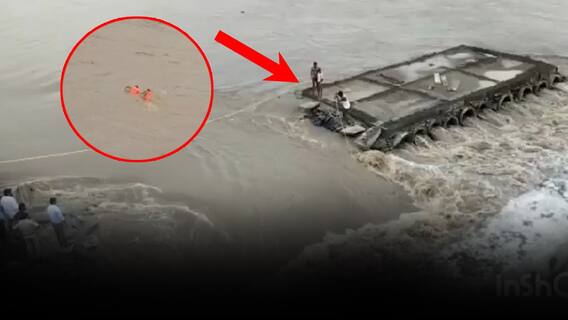 Two Men Stuck In Water Flow In Adilabad: వాగు ప్రవాహంలో చిక్కుకున్న ఇద్దరు కూలీలు