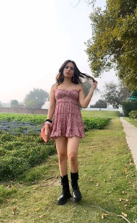 Sargun in a printed mini dress