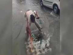 Woman Cop Cleans Clogged Drain With Bare Hands To Drain Rainwater In Viral Video 