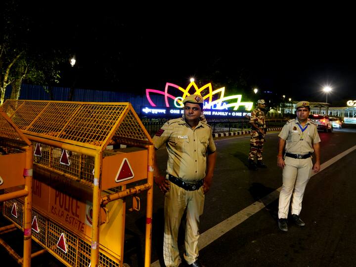 Delhi Police personnel at Pragati Maidan stand guard ahead of the G20 Summit. (Source:PTI)
