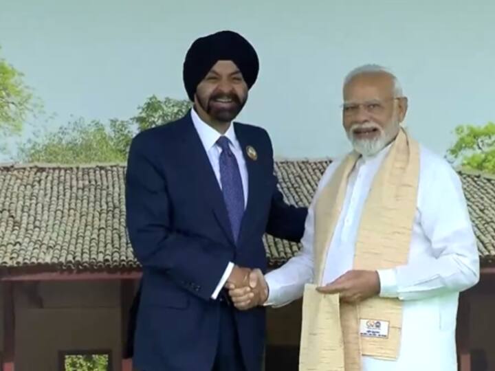 PM Modi with the President of the World Bank, Ajay Banga at Rajghat. (Image Source: Twitter/@ANI)