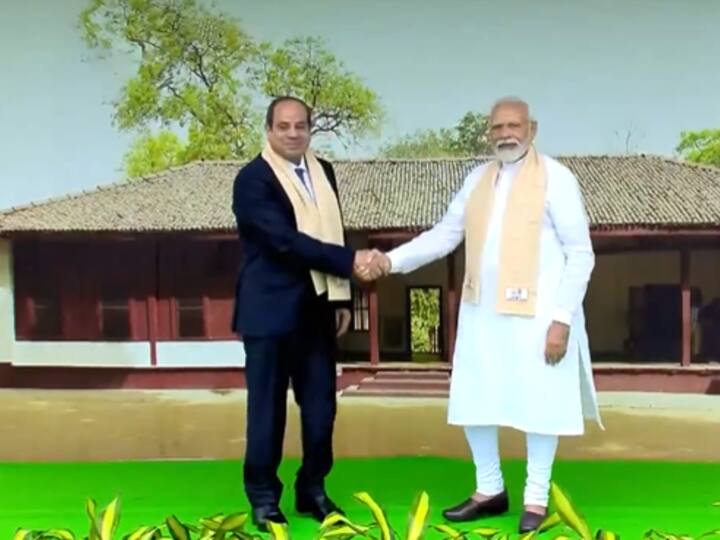 Prime Minister Narendra Modi shook hands with the Egyptian President, Abdel Fattah El-Sisi, upon his arrival at Delhi's Rajghat to pay homage to Mahatma Gandhi. (Image Source: Twitter/@ANI)
