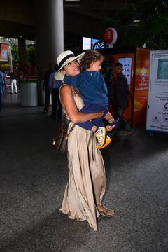 Shriya Saran Spotted With Her Daughter At Mumbai Airport - See Pics