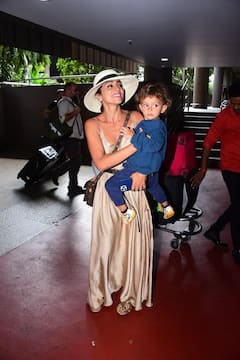 Shriya Saran Spotted With Her Daughter At Mumbai Airport - See Pics