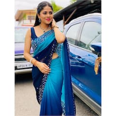 Brahmamudi Sharmitha Gowda: నీలిరంగు చీరలో 'బ్రహ్మముడి' రుద్రాణి అదిరింది!