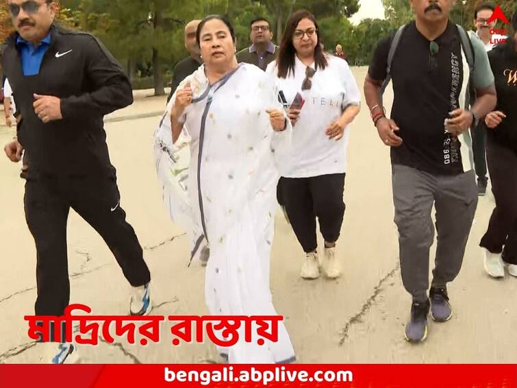 West Bengal CM Mamata Banerjee jogs in Spain capital Madrid says I am from India to Locals Mamata Banerjee: ‘ভারত থেকে এসেছি’, জগিংয়ের ফাঁকে মাদ্রিদে স্থানীয়দের সঙ্গেও আলাপচারিতা মমতার