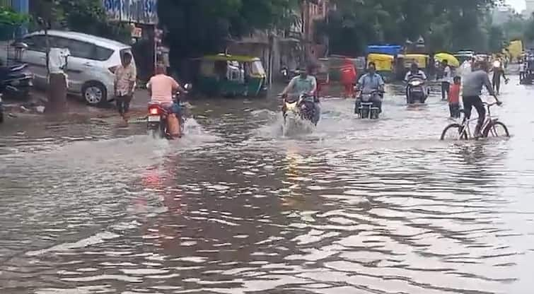 Heavy Rainfall in Ahmedabad city  અમદાવાદના અનેક વિસ્તારોમાં મૂશળધાર વરસાદ, ઠેર-ઠેર ભરાયા પાણી, વાહનચાલકો પરેશાન