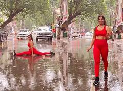 Rajkot: યુવતિએ વરસતા વરસાદમાં ટ્રાફિકને અડચણરૂપ થઈ બનાવી રીલ્સ