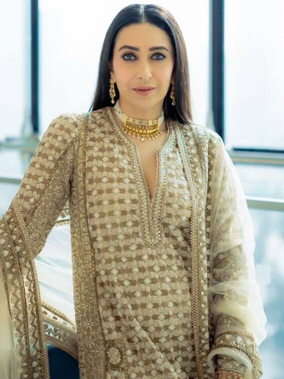 Karisma Kapoor Slips Into A Golden Embroidered Salwar Suit