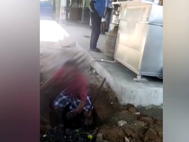 Periyakulam municipality sanitation worker cleans the blockage in the sewer waste water with his bare hands TNN பணியாளர் வெறுங்கையால் சாக்கடை சுத்தம் பெய்யும் அவலம்; பெரியகுளம் நகராட்சி மெத்தனம்